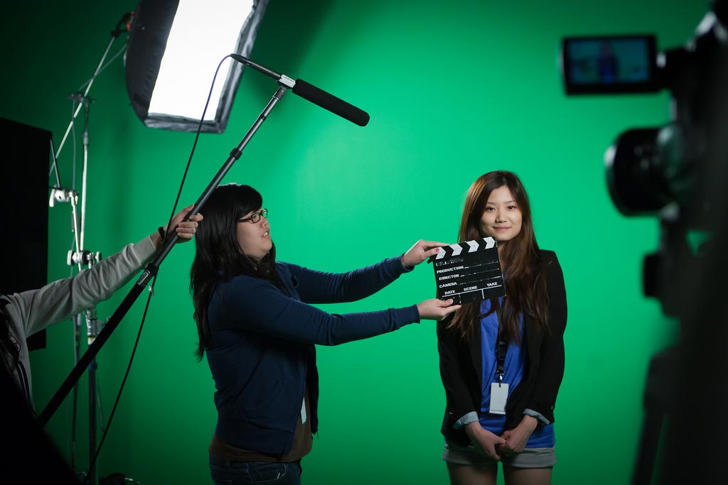 Students on shoot on greenscreen set