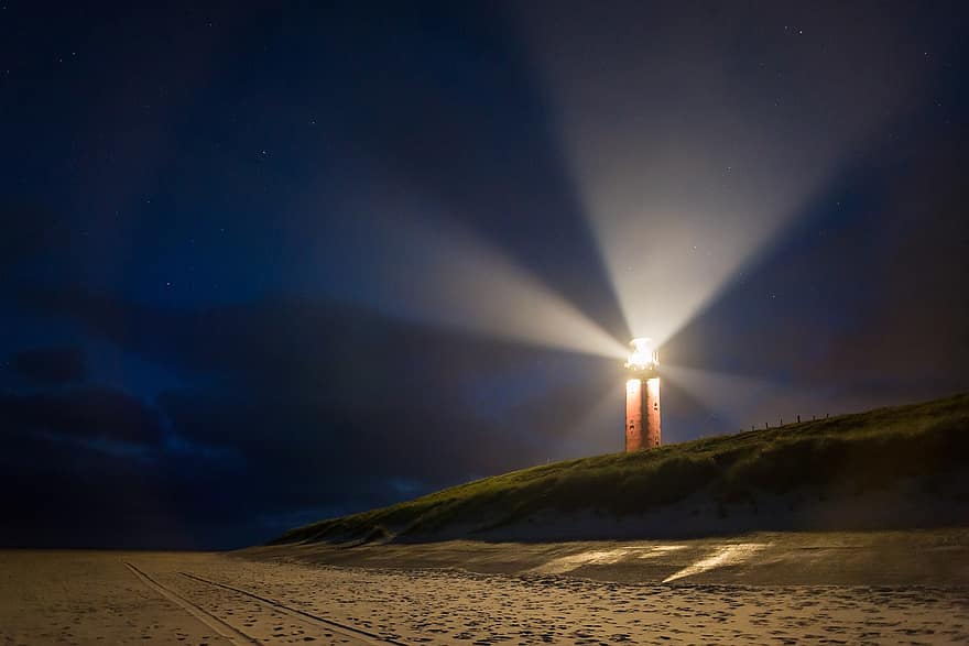 Lighthouse shines in darkness